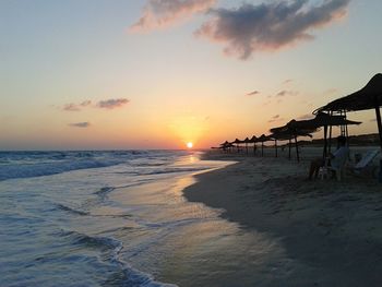 View of beach at sunset