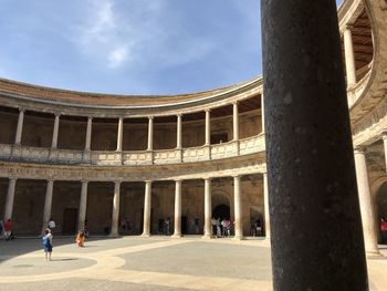 Group of people in front of historical building