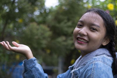 Portrait of smiling teen girl outdoors