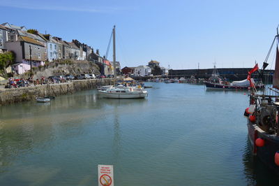 Boats moored in harbor