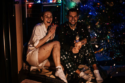 Merry christmas and happy new year. young couple in love celebrating christmas or new year eve at