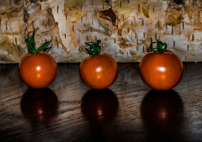 Close-up of oranges on table