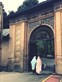 Man looking at entrance of building