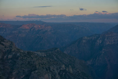 Aerial view of rock formations against sky during dusk in copper canyon / barrancas del cobre