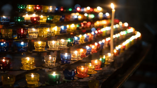 Colorful candles in church for prayers 