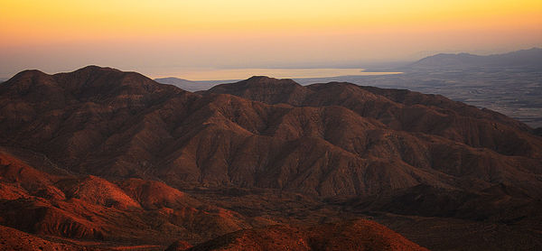 Scenic view of mountains at sunset