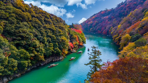 Arashiyama in autumn season along the river in kyoto, japan,  arashiyama, kyoto, japan, asia.