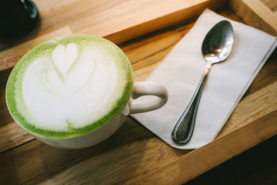 Close-up of coffee cup on table