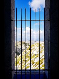 Panoramic view of building seen through window