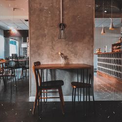 Empty chairs and table in restaurant