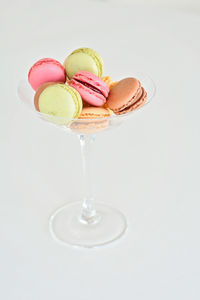 Close-up of cake on table against white background