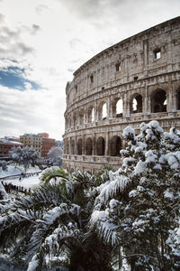 View of historic building against sky during winter
