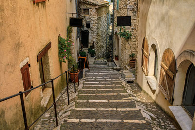 Rear view of man walking on steps