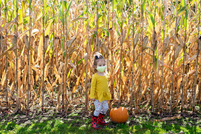 Full length of child on field