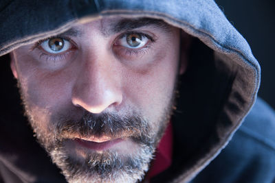 Portrait of a man wearing hood