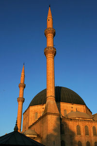 View of historic building against clear blue sky