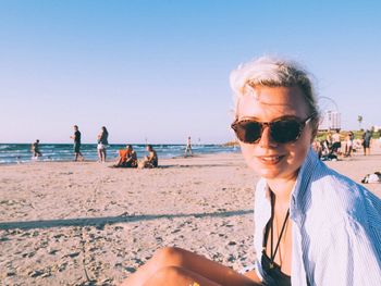 Woman sitting on beach