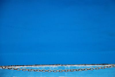 Low angle view of tree against clear blue sky