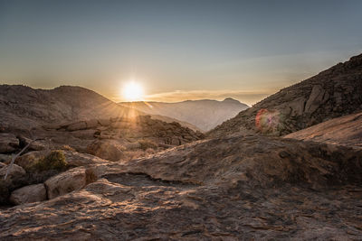 Scenic view of mountains against sky during sunset