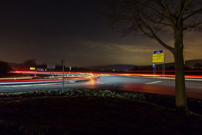 Light trails on road at night