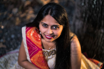 Portrait of smiling young woman