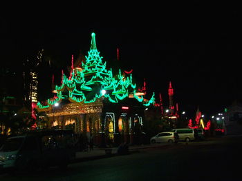 Illuminated christmas tree at night