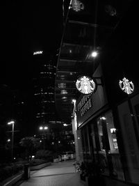 Low angle view of illuminated street light at night