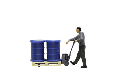 Rear view of man standing against white background