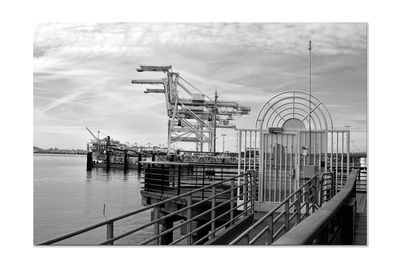 Pier over sea against sky