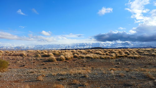 Scenic view of land against sky