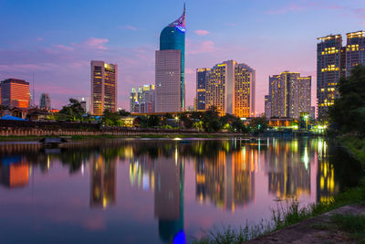 Reflection of illuminated city at night