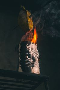 Close-up of fire burning at night