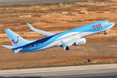 Side view of airplane against the sky