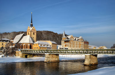 View of river with church in background