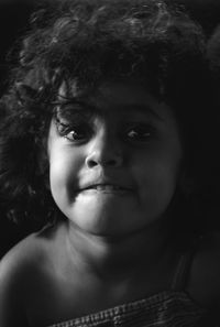 Close-up of girl with frizzy hair