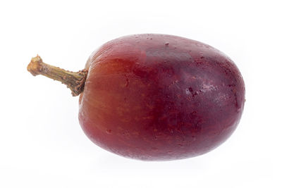 Close-up of apple against white background