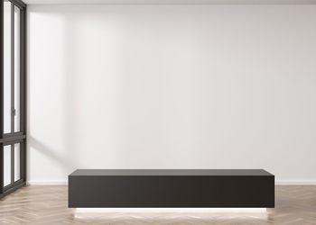 Empty white wall in modern art gallery. mock up interior in minimalist style. free, copy space
