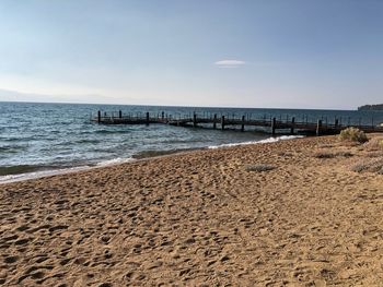 Scenic view of beach against sky