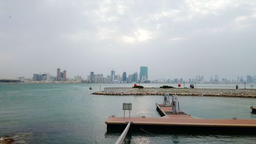 Scenic view of city against sky