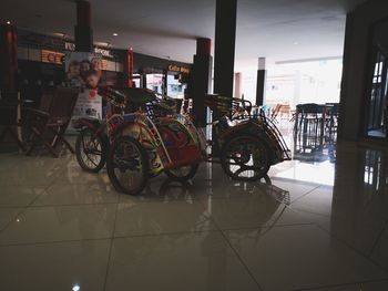 Bicycles parked on tiled floor