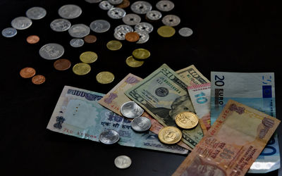 High angle view of coins on table