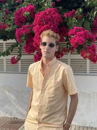 Portrait of man with flowers