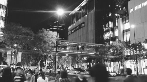People on street at night