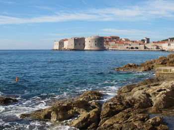 Seascape view of ancient city of dubrovnik rocky coast castle fortress location for game of thrones 