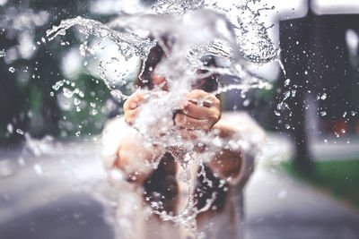 Portrait of boy in water