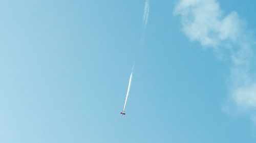 Low angle view of vapor trail in sky