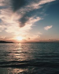 Scenic view of sea at sunset