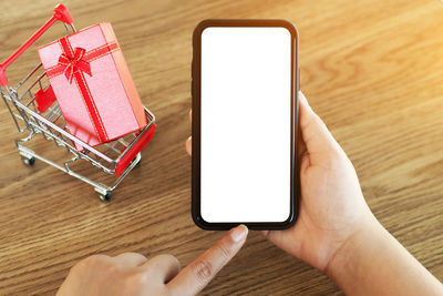 Low angle view of mobile phone on table