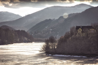 Scenic view of mountains against sky during winter