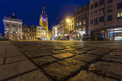 Illuminated buildings in city at night